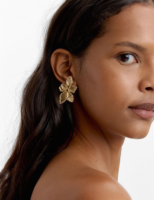 Aretes largos de flor Parfois Golden Delicates