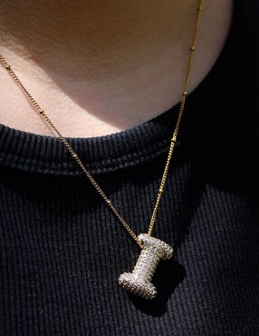 Collar de letras Clepsidra