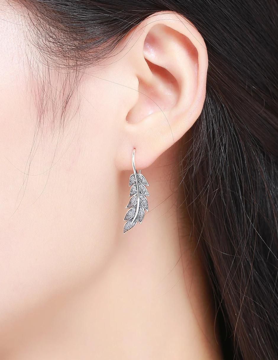 Aretes de pluma de plata P 925 con acabado pavé circonita