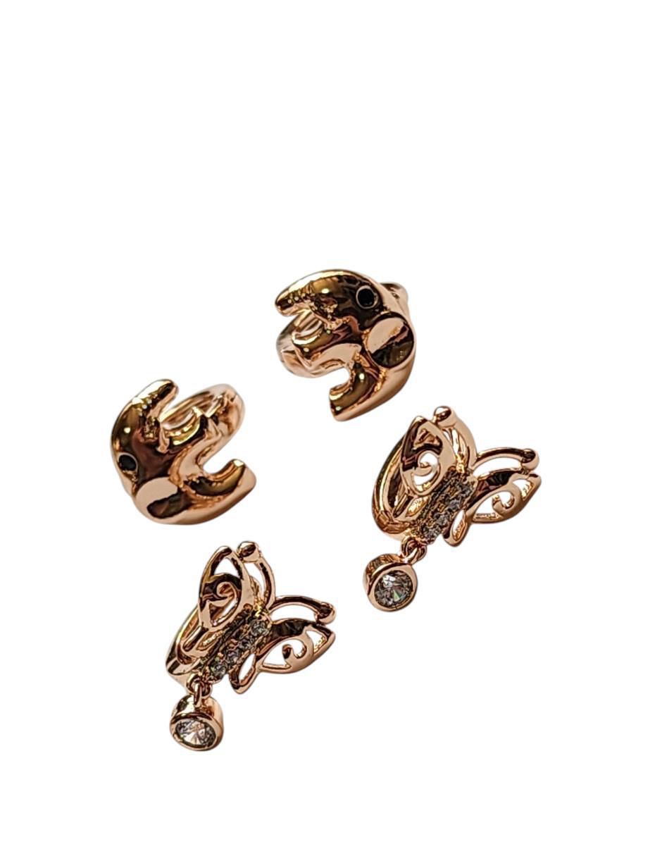 Set huggies de mariposa  14 k con acabado pulido zirconia 2