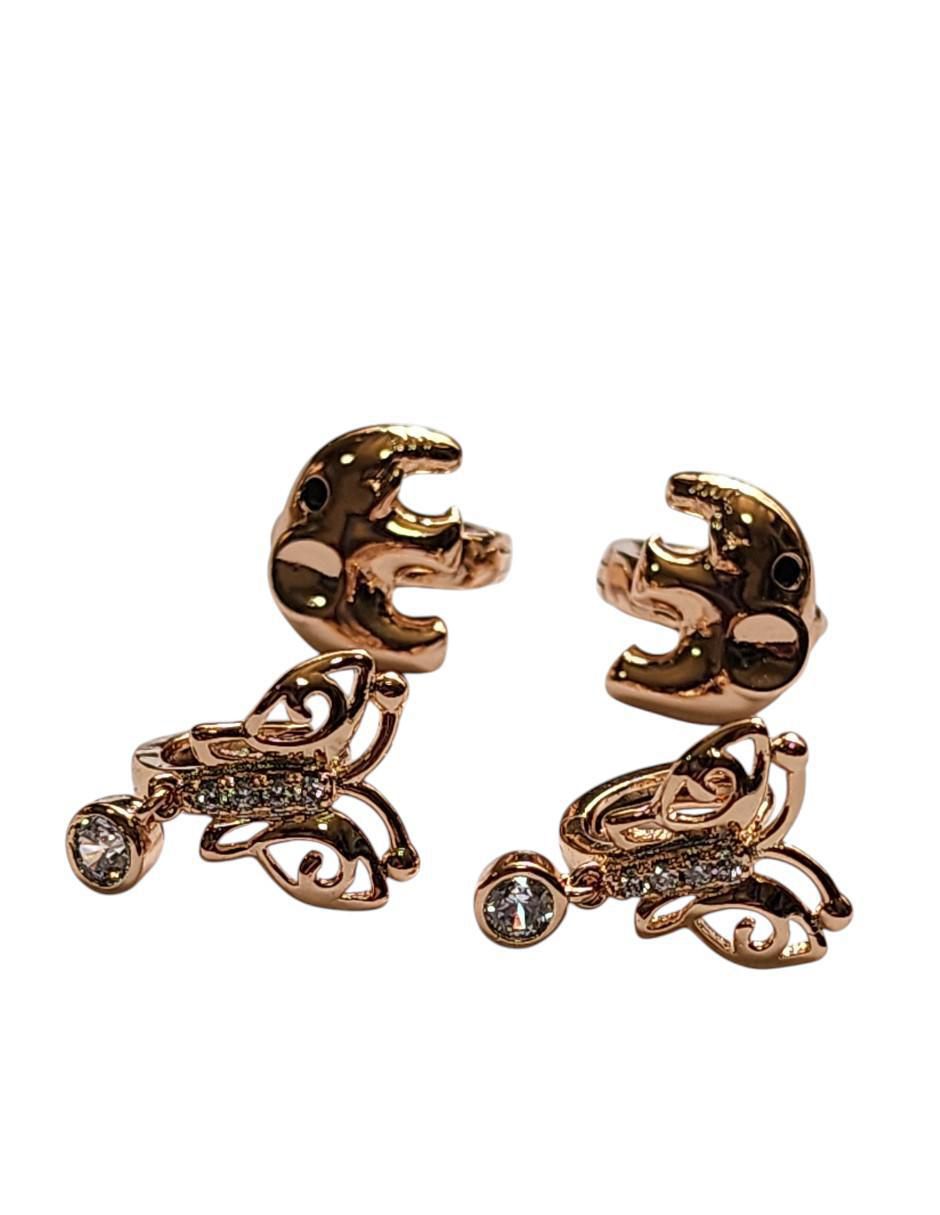 Set huggies de mariposa  14 k con acabado pulido zirconia 5