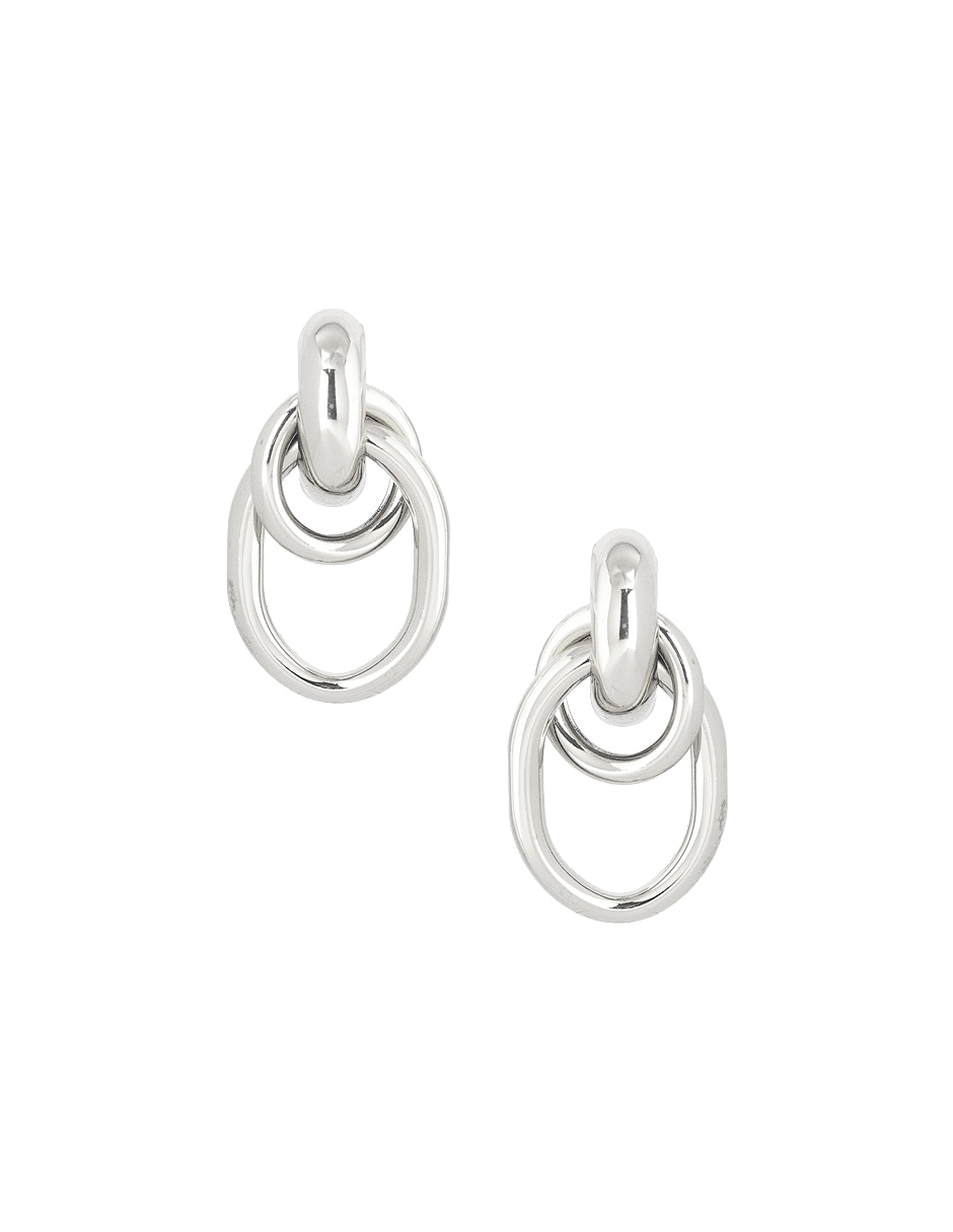 Aretes largos ovalados con acabado lustre