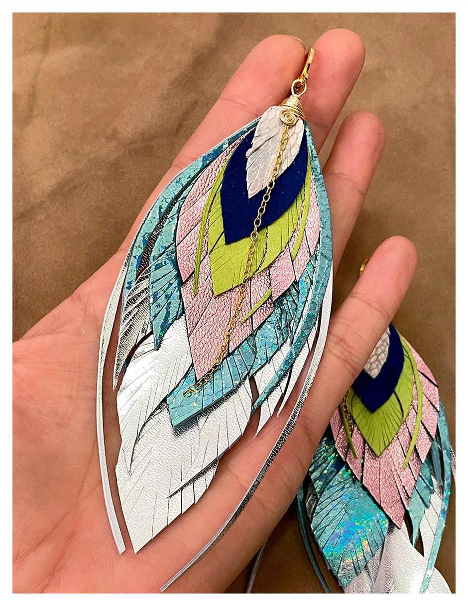 Aretes largos de pluma 18 k con acabado baño de oro 4