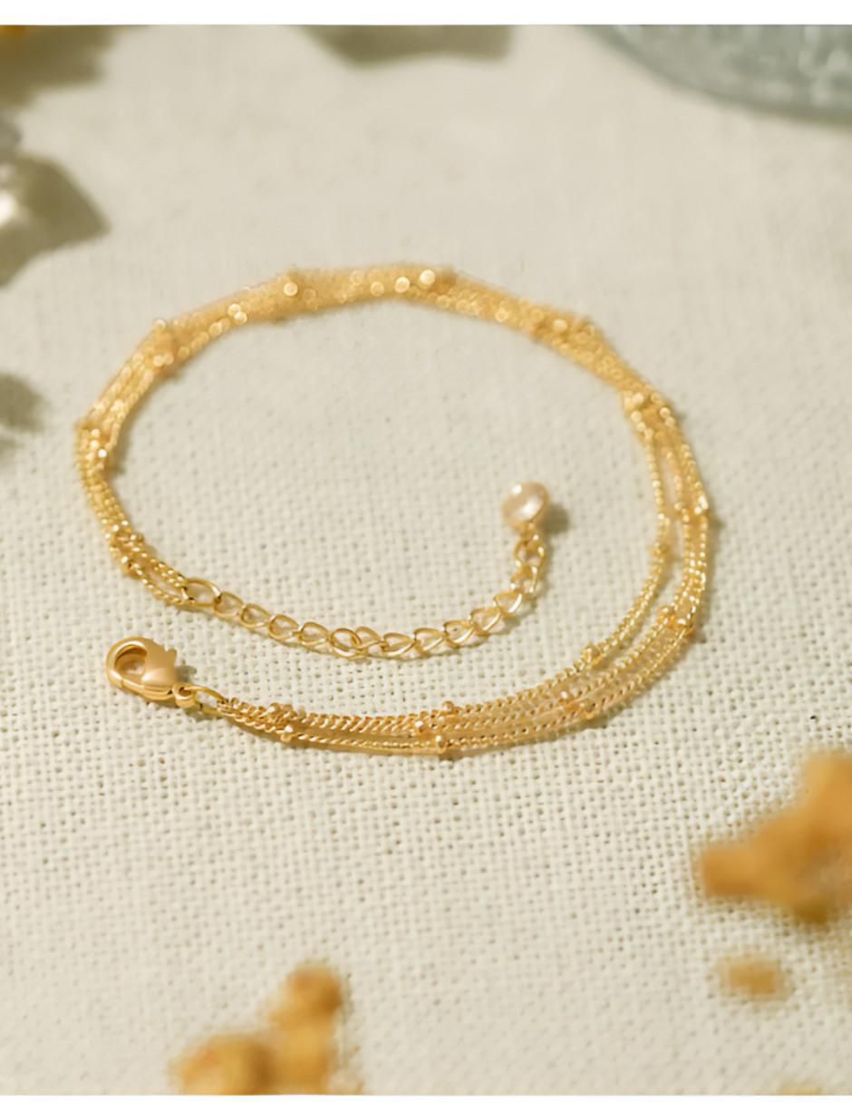 Pulsera con acabado baño de oro 14 K 4