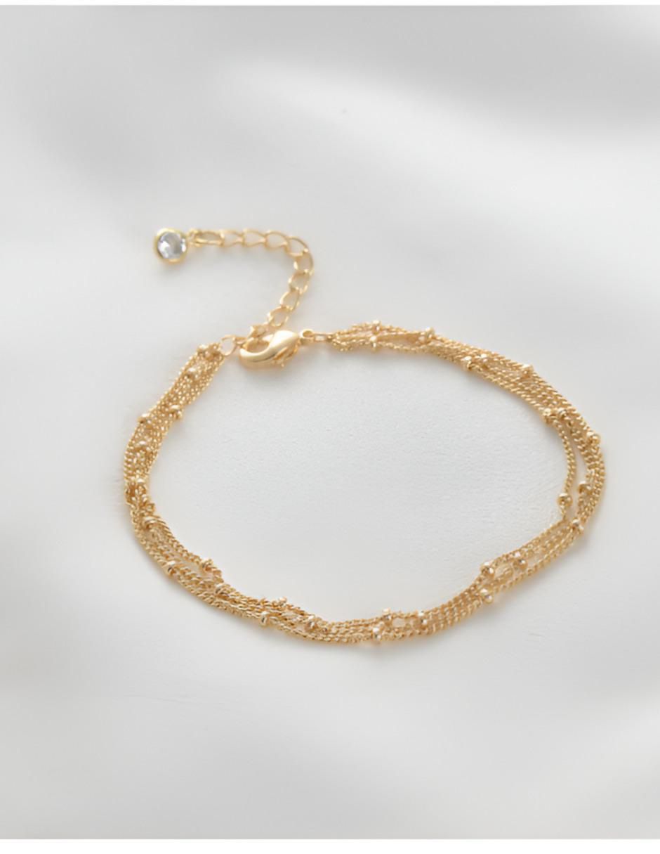 Pulsera con acabado baño de oro 14 K 5