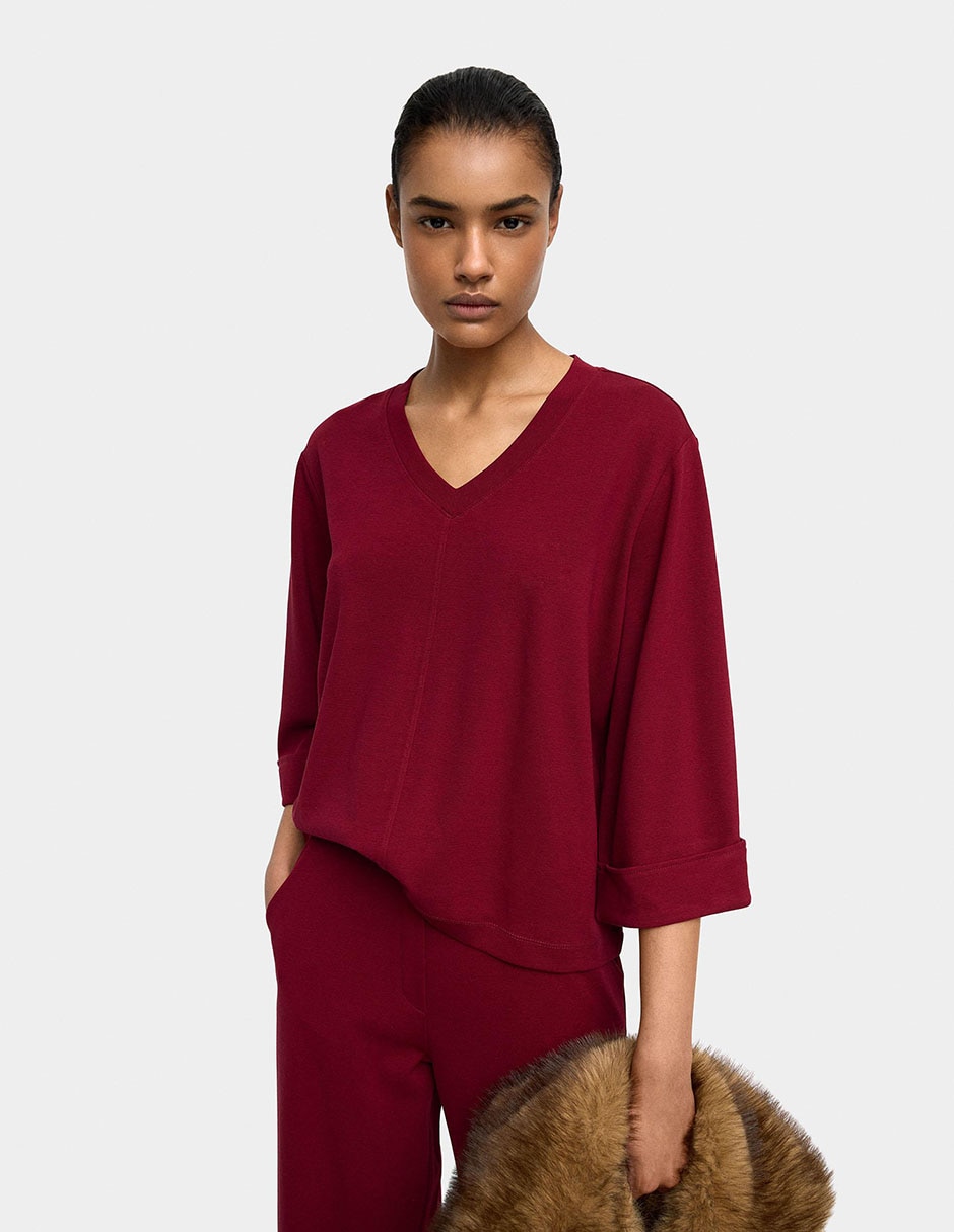 Top cuello V