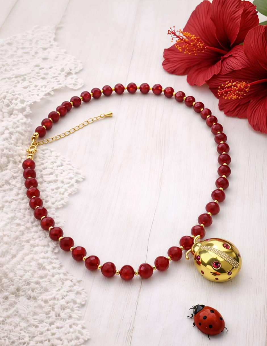 Collar con dije de catarina 18 K 5